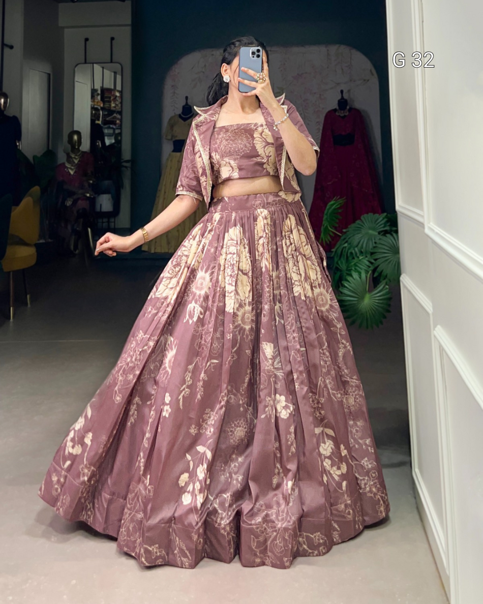 Person wearing a floral two-piece outfit in a room with a mirror and plant.
