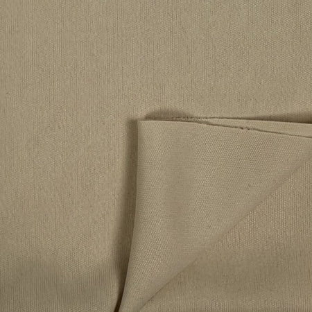 Close-up of beige fabric with a slight texture
