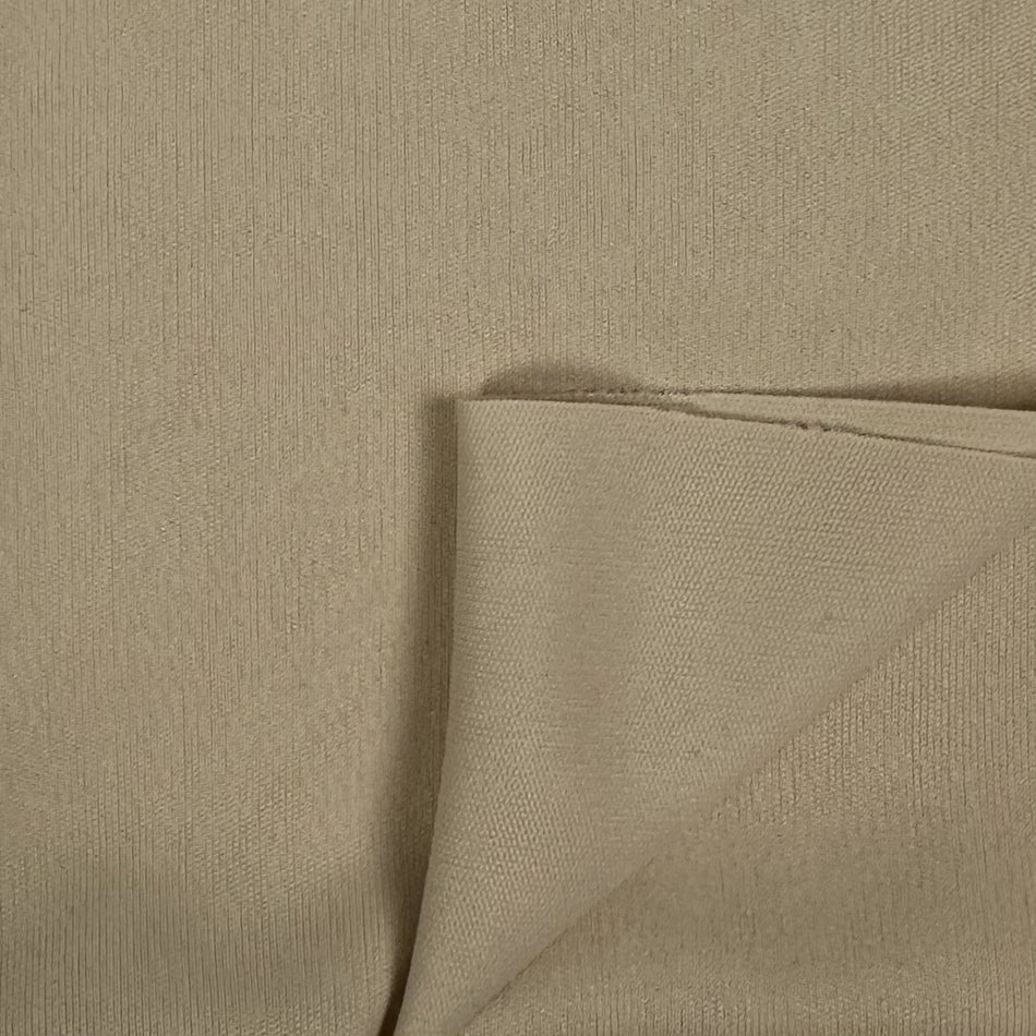 Close-up of beige fabric with a slight texture