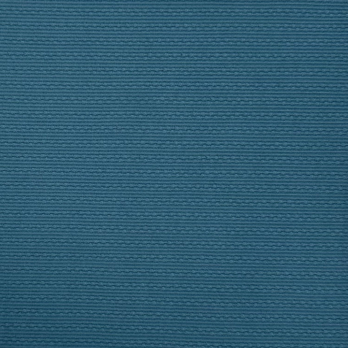 Solid teal color swatch with a textured pattern