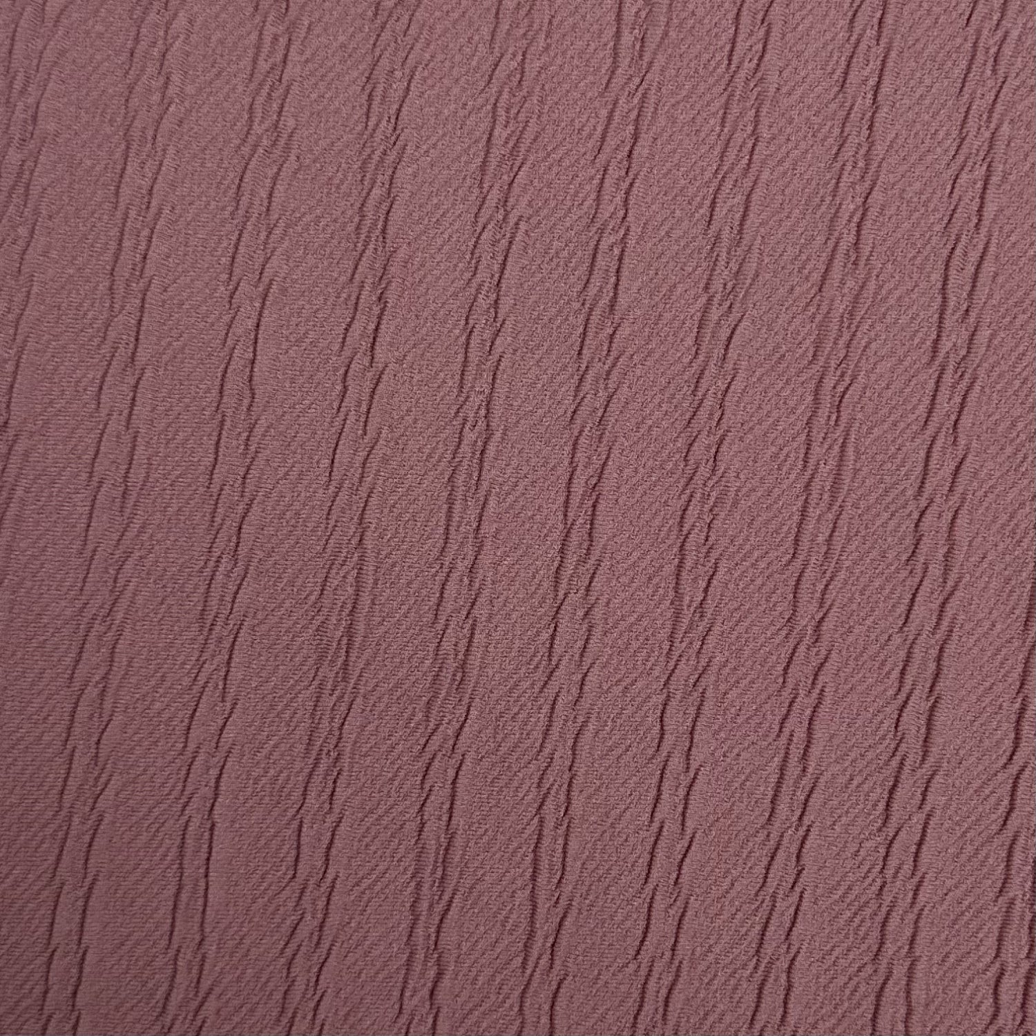 Textured purple fabric pattern