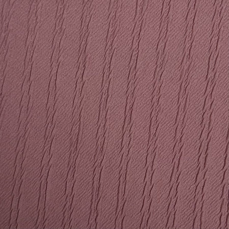 Textured purple fabric pattern