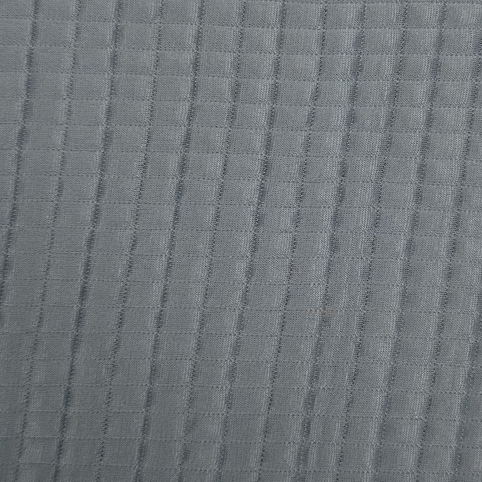 Close-up of textured gray fabric with a subtle pattern