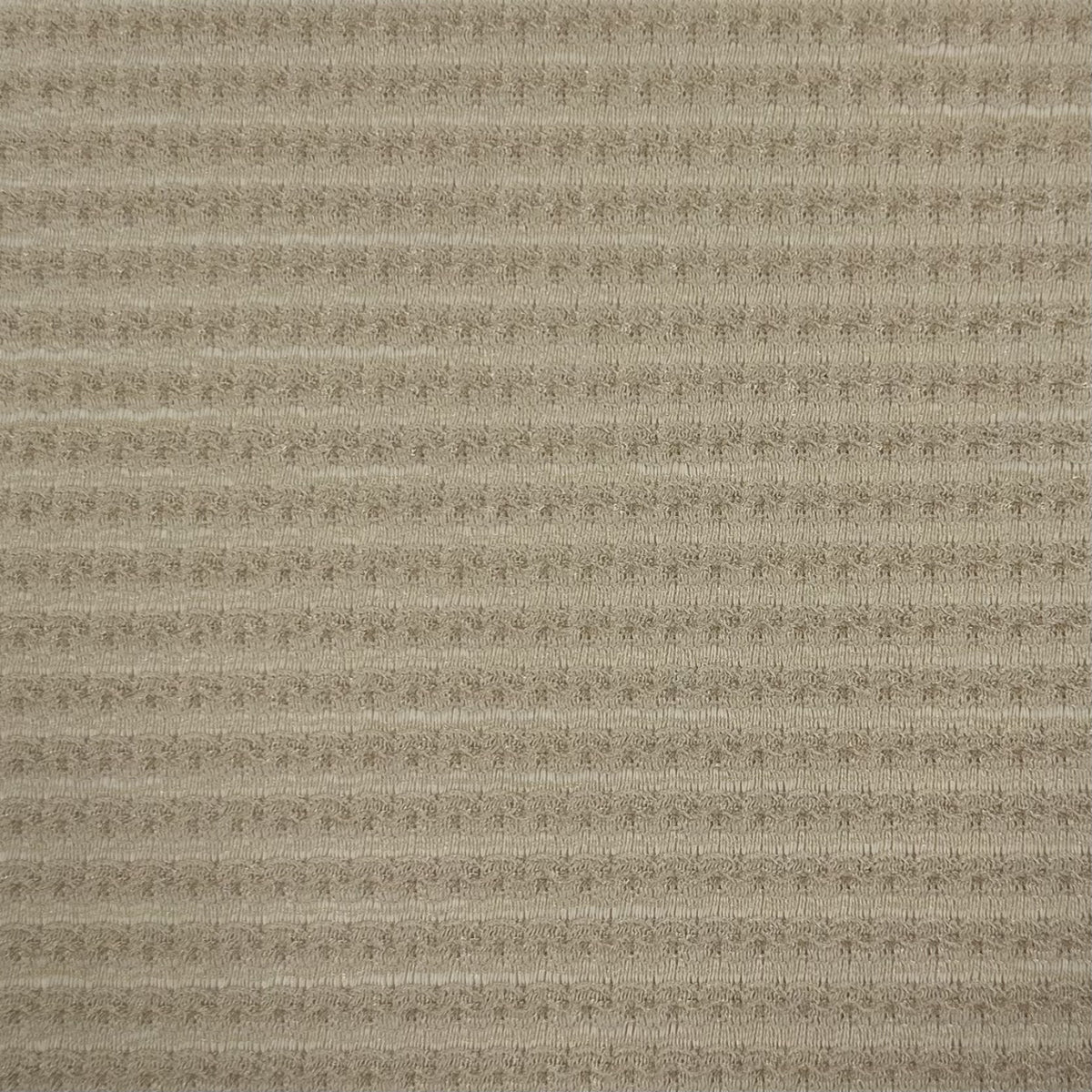 Textured beige fabric pattern
