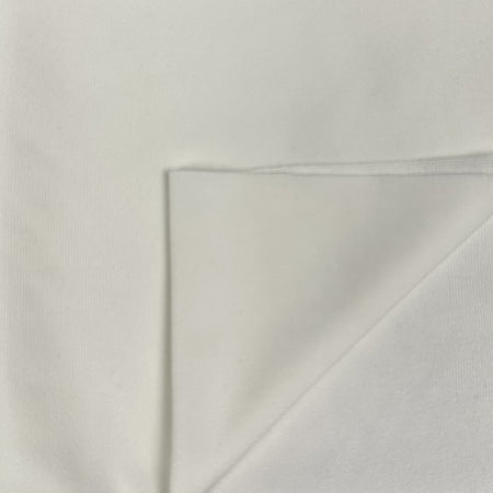 White fabric with a subtle pattern on a white background