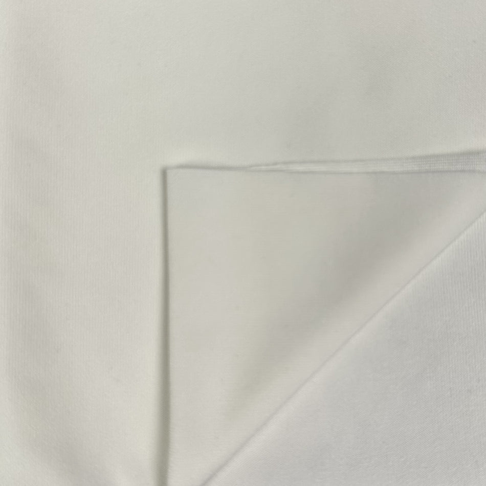 White fabric with a subtle pattern on a white background