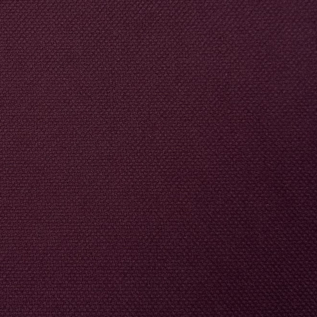 Solid dark purple color swatch with a subtle pattern