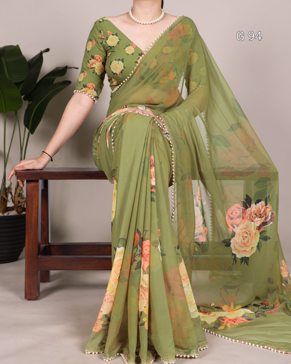Green floral saree with a matching blouse, draped over a chair.