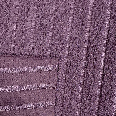 Close-up of textured purple fabric with a cable knit pattern