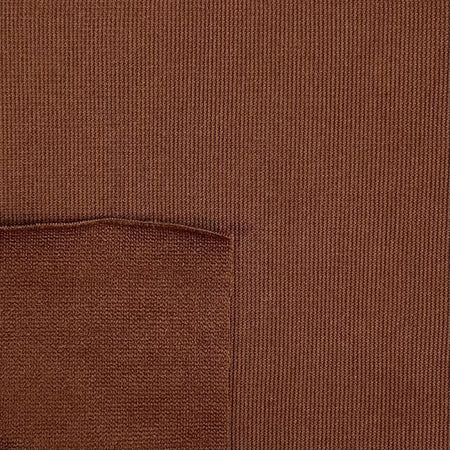 Close-up of brown fabric with a pocket