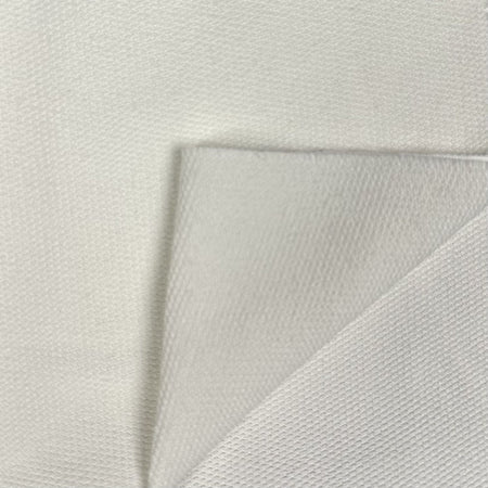 Close-up of textured light gray fabric on a matching background