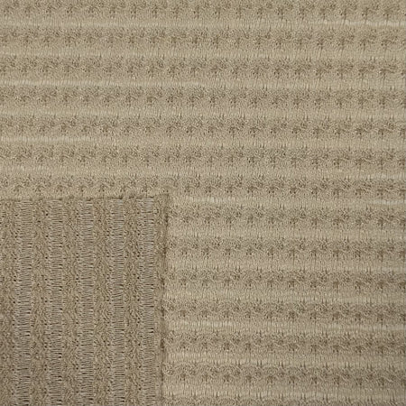 Textured beige carpet with a subtle pattern