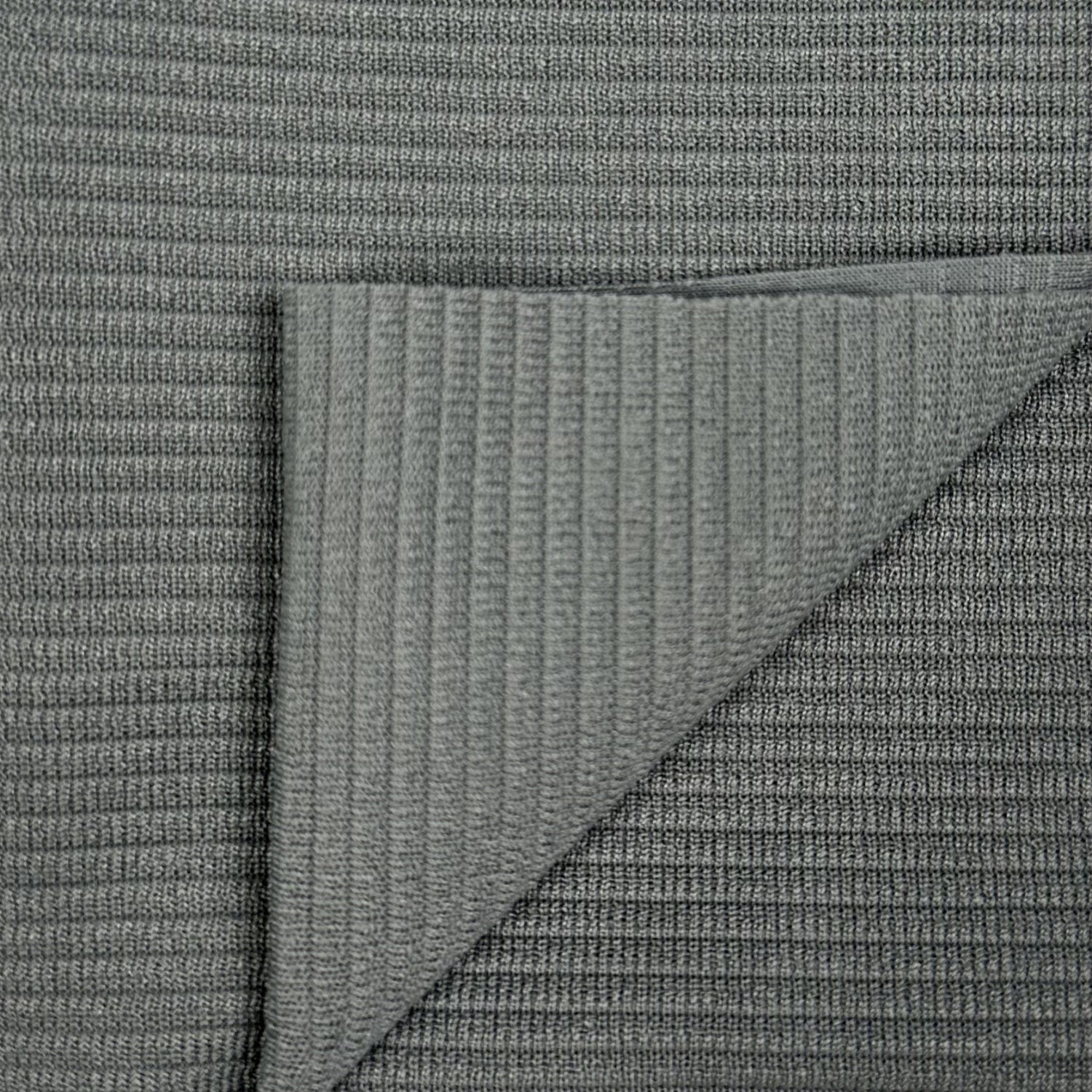 Close-up of textured gray fabric with diagonal pattern