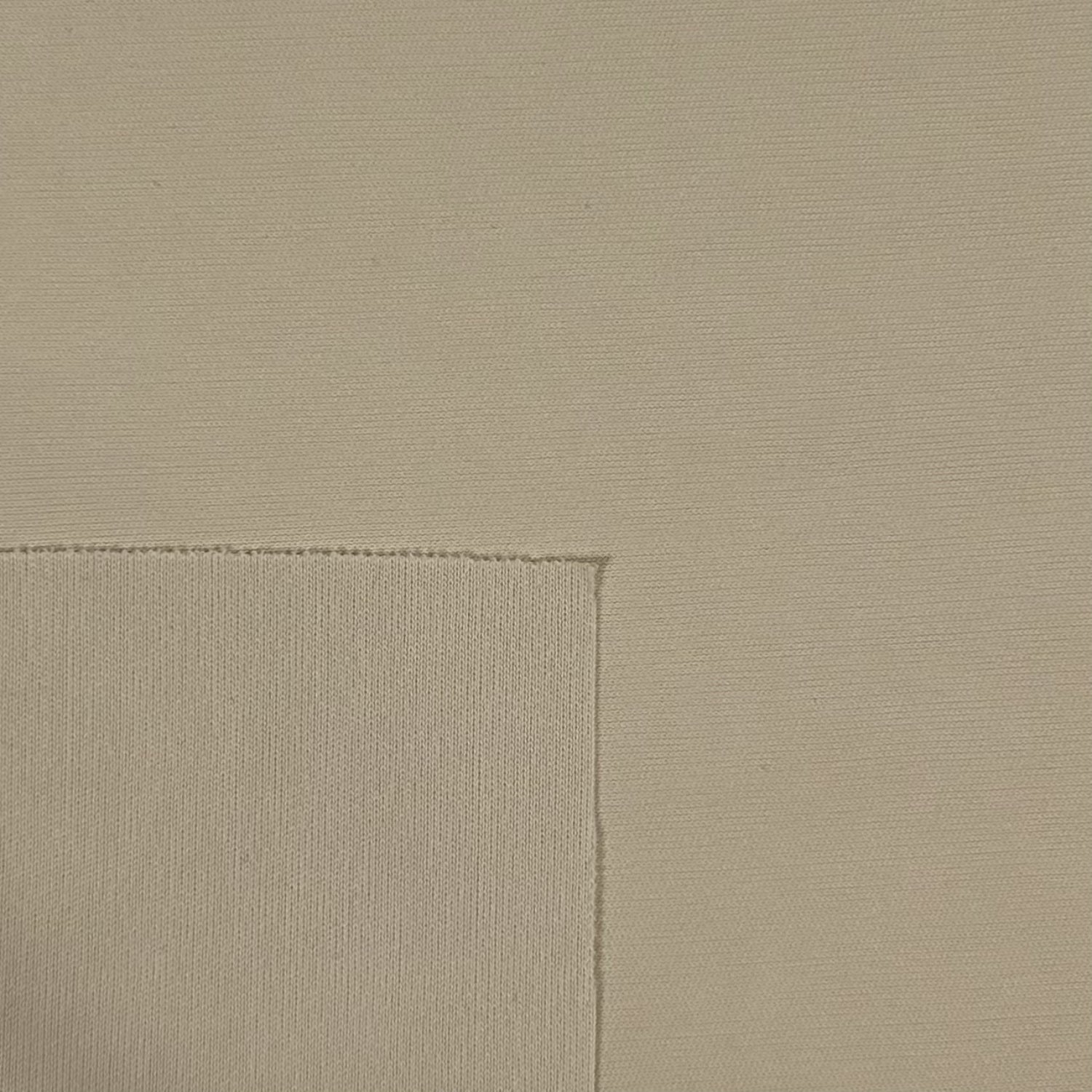 Beige fabric texture with a subtle pattern