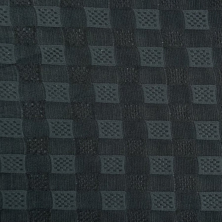 Dark gray textured fabric with a checkered pattern