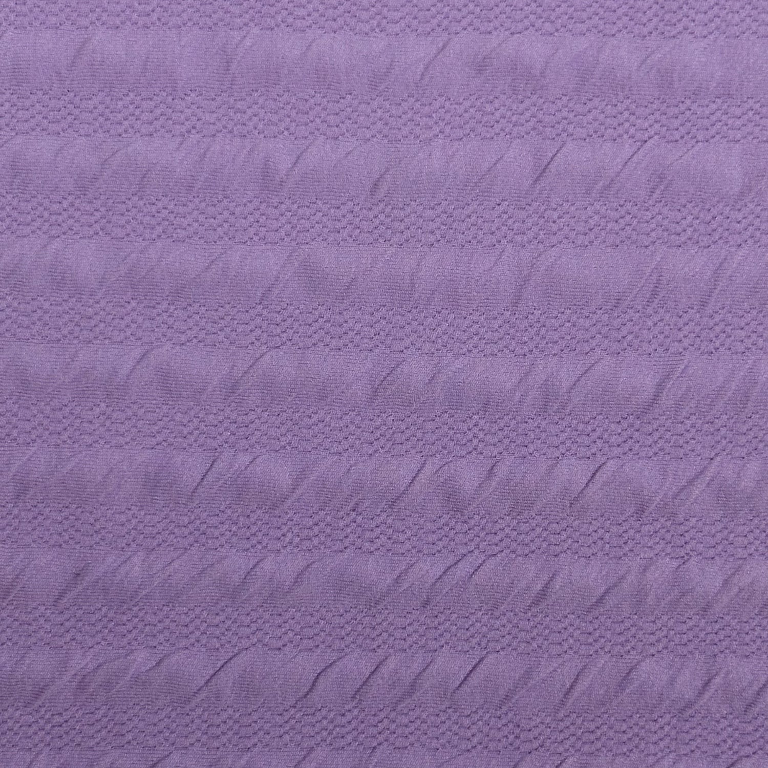 Close-up of textured purple fabric