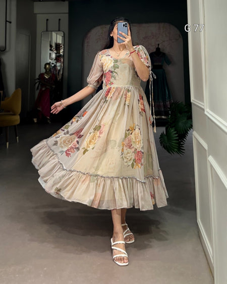 Woman wearing a floral dress in an indoor setting