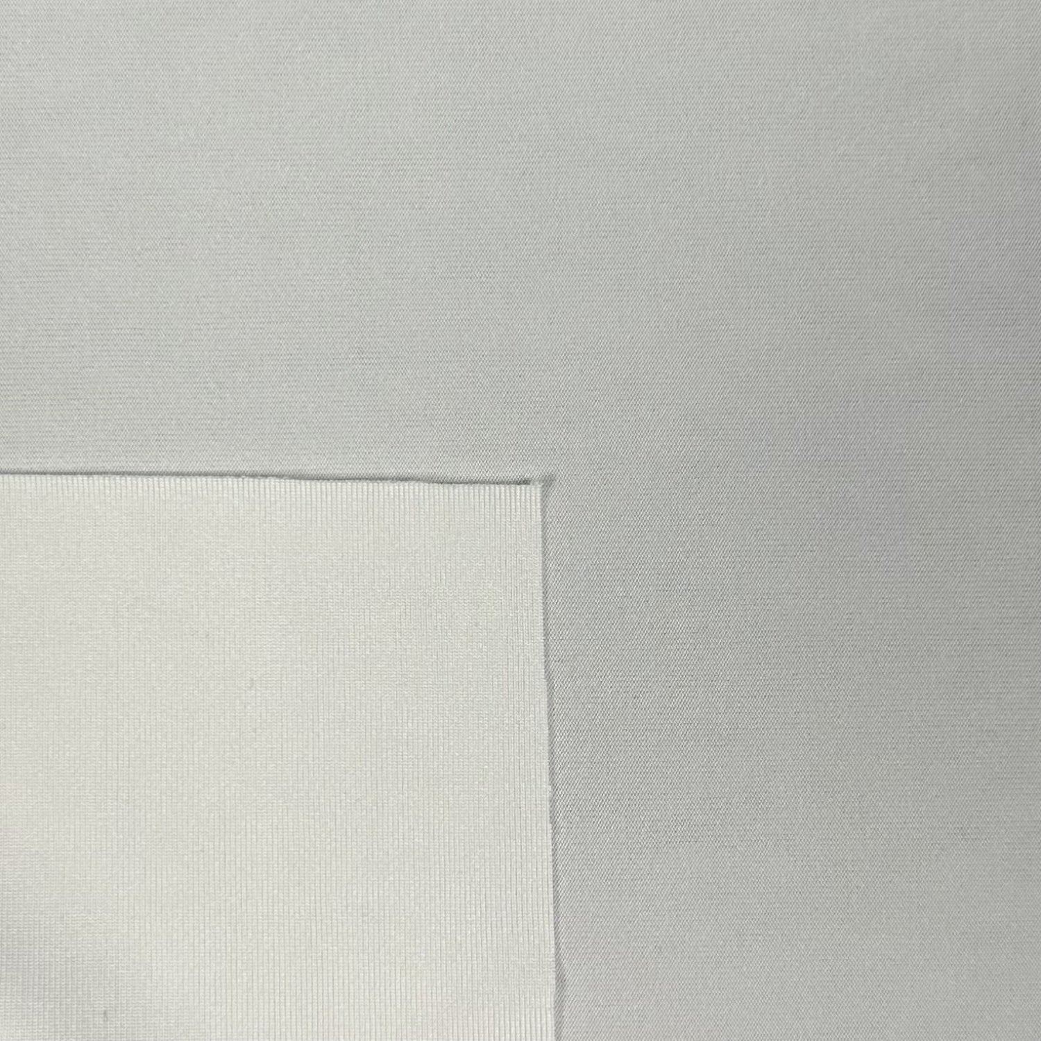Close-up of a textured gray surface with a subtle pattern