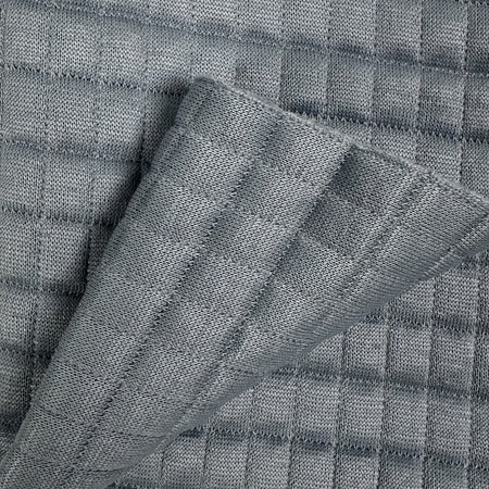 Close-up of textured gray fabric with a checkered pattern