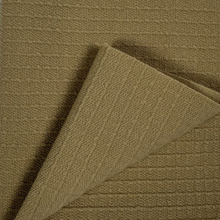Close-up of brown textured fabric with a diagonal fold