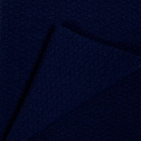 Navy blue fabric texture with a subtle pattern