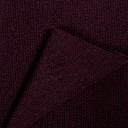 Close-up of dark purple fabric texture