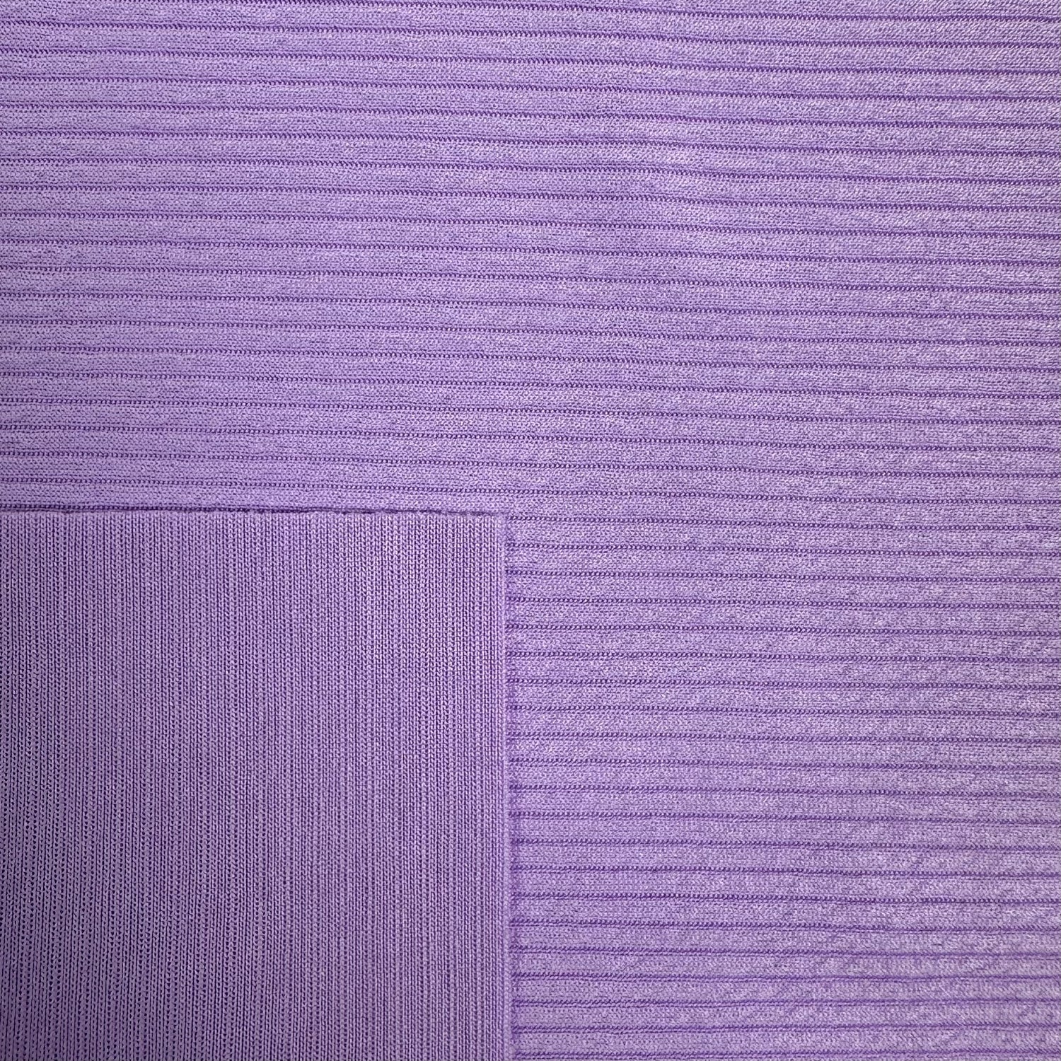 Close-up of purple fabric with a subtle pattern