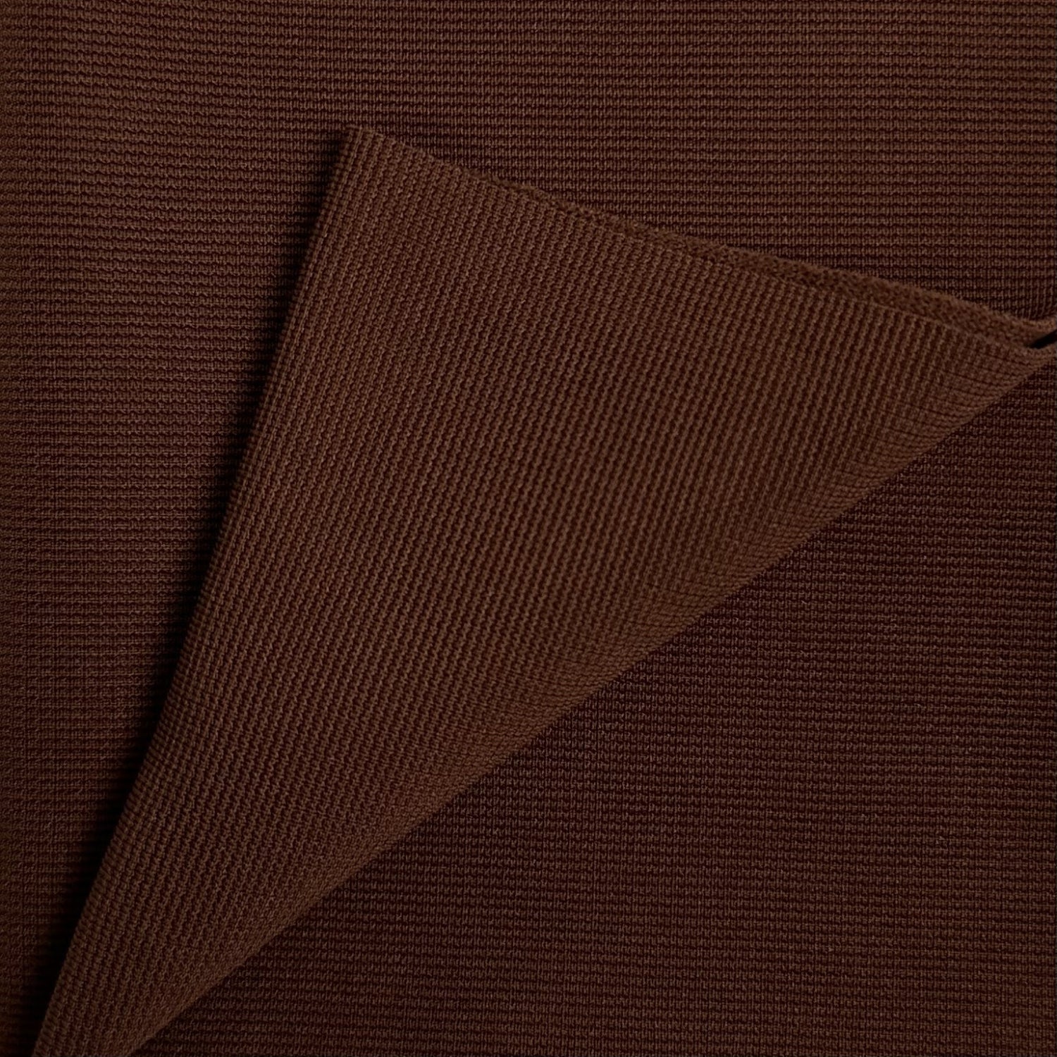 Brown fabric with a textured pattern