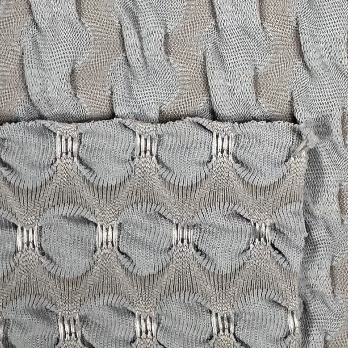 Close-up of textured fabric with a geometric pattern