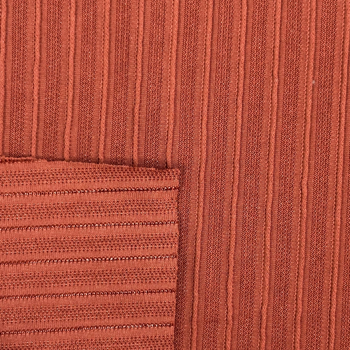 Close-up of ribbed brown fabric texture