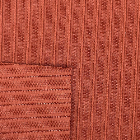 Close-up of ribbed brown fabric texture