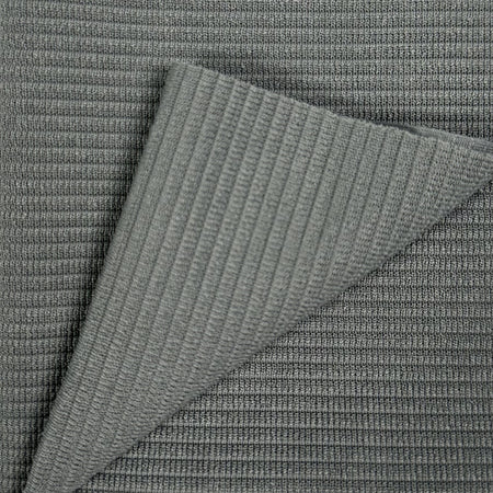 Close-up of textured gray fabric with a diagonal pattern