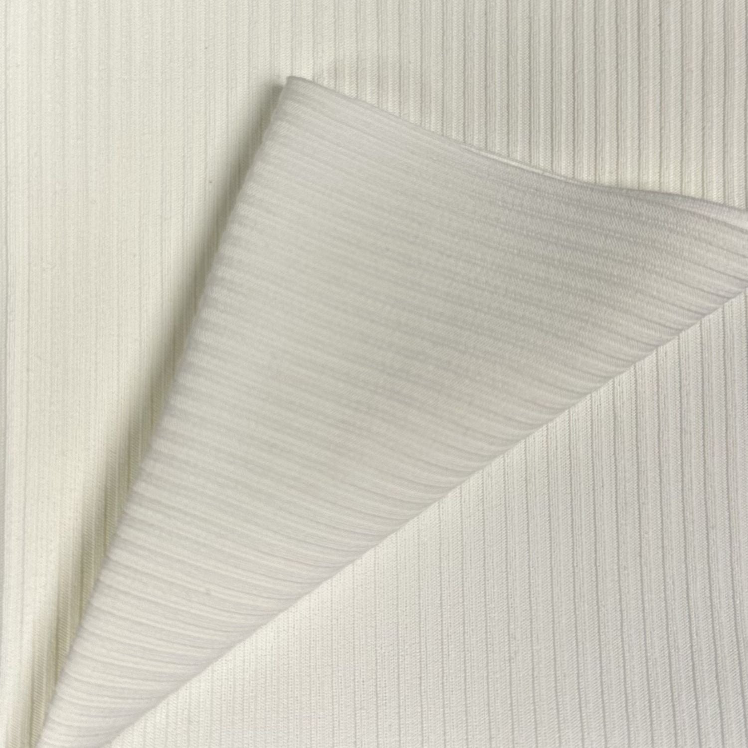 Close-up of textured gray fabric on a matching background