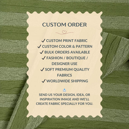 Custom order information card on a green fabric background