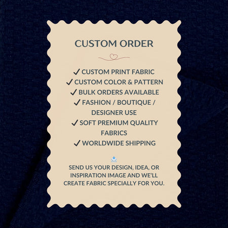 Custom order information card on a dark fabric background