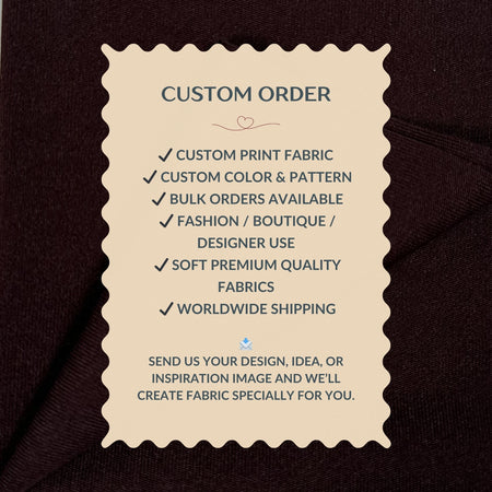 Custom order information card on a dark fabric background