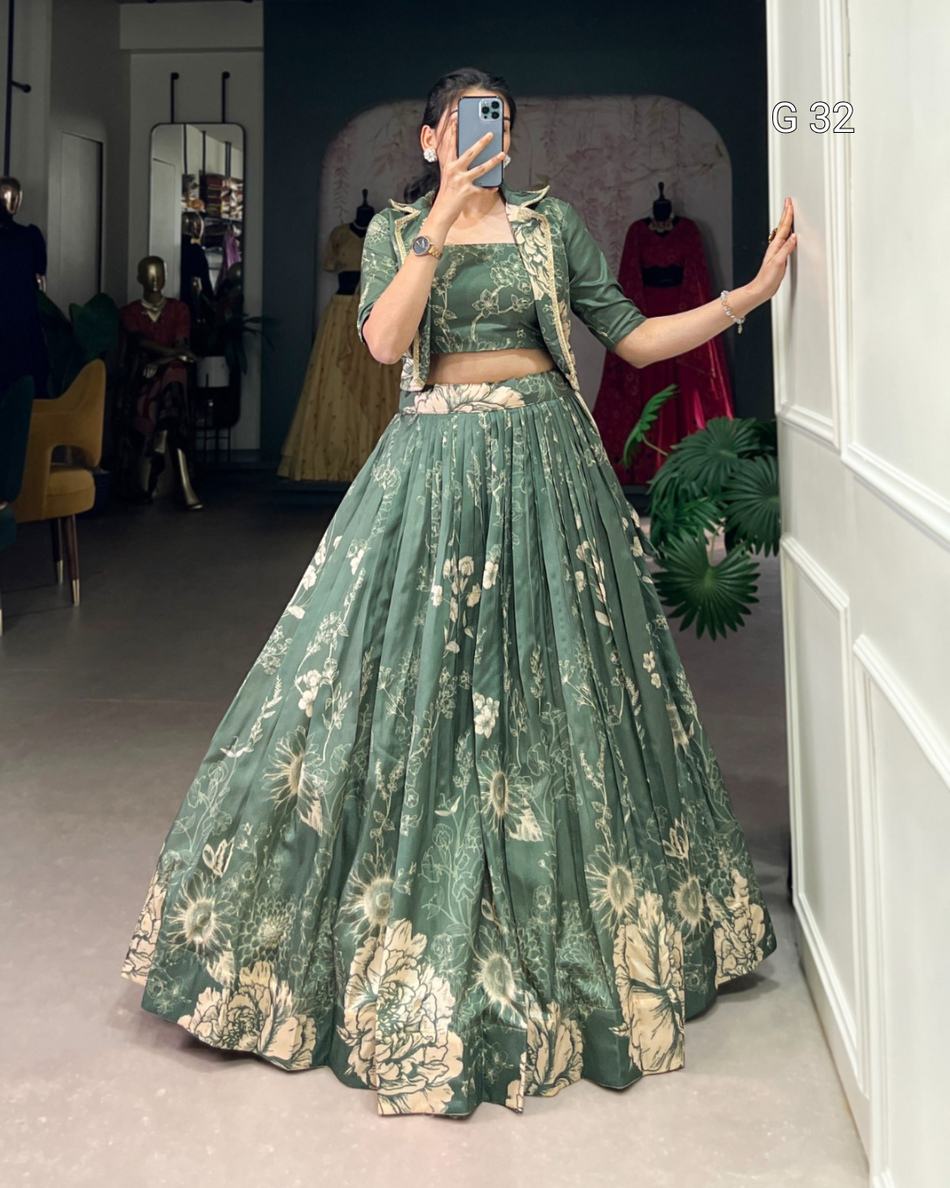 Person wearing a green floral traditional outfit taking a mirror selfie.