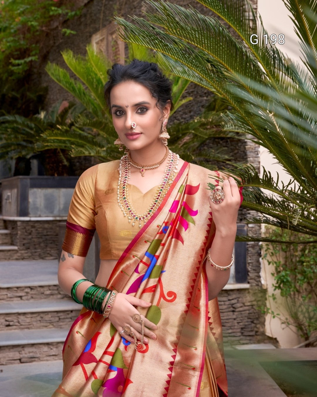 Woman in a traditional saree with a garden background