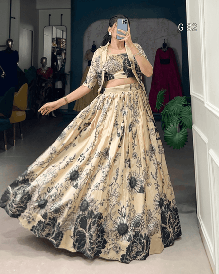 Woman wearing a floral outfit taking a mirror selfie in a room.