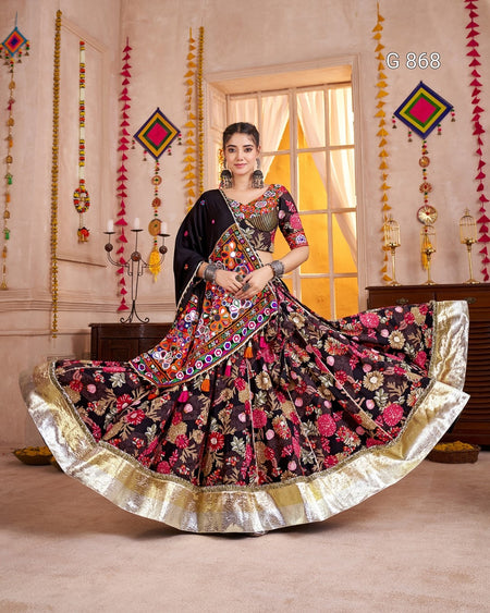 Woman in a traditional floral saree with a decorative background