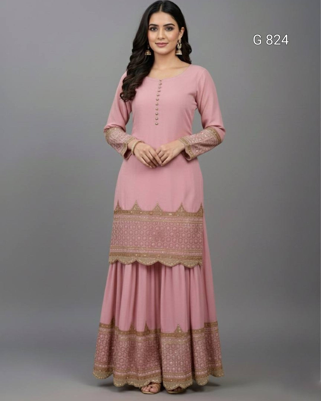 Woman wearing a pink traditional outfit with gold patterns on a gray background