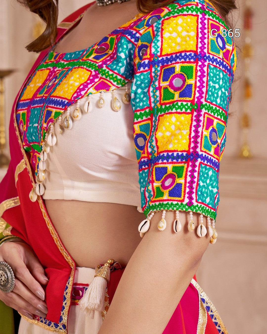 Colorful traditional garment with geometric patterns on a neutral background
