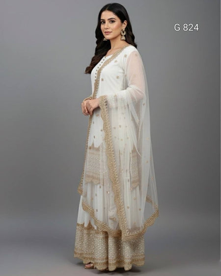 Woman wearing a white and gold traditional outfit on a gray background