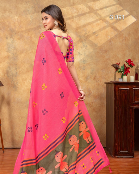 Woman wearing a pink saree with floral patterns in a room setting