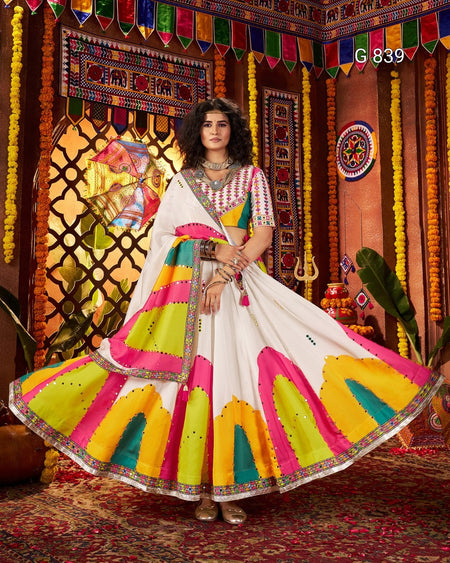 Woman in a colorful traditional outfit with a vibrant background