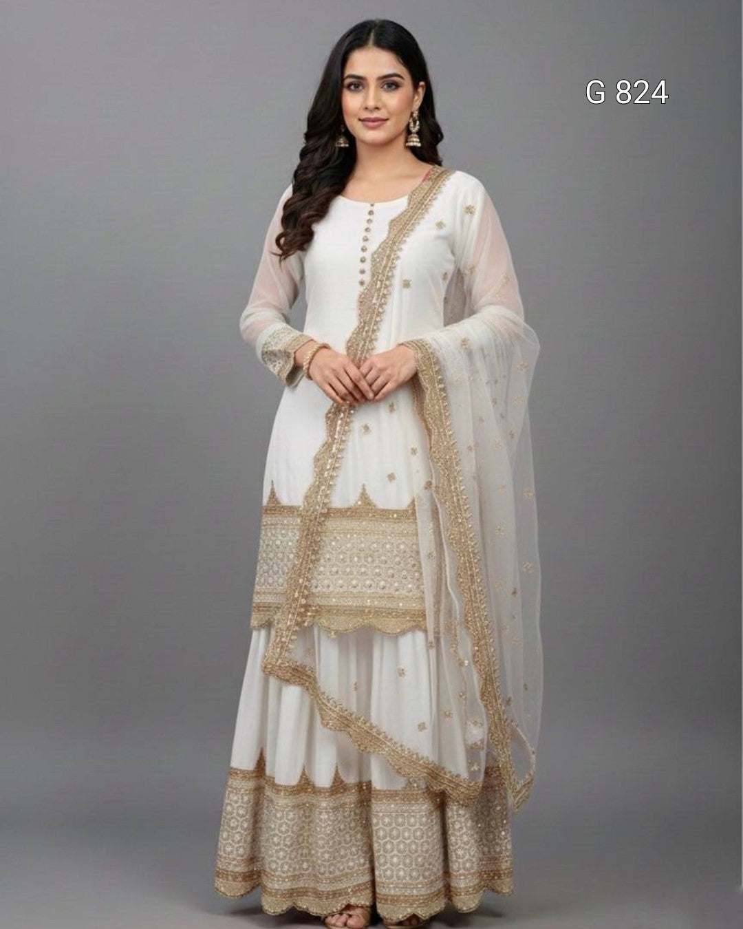 Woman wearing a white and beige traditional outfit with a matching dupatta on a gray background