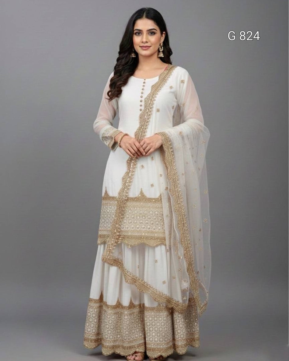 Woman wearing a white and beige traditional outfit with a matching dupatta on a gray background