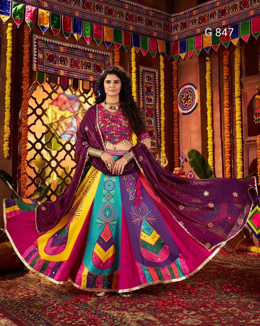 Woman in a colorful traditional outfit with a vibrant background