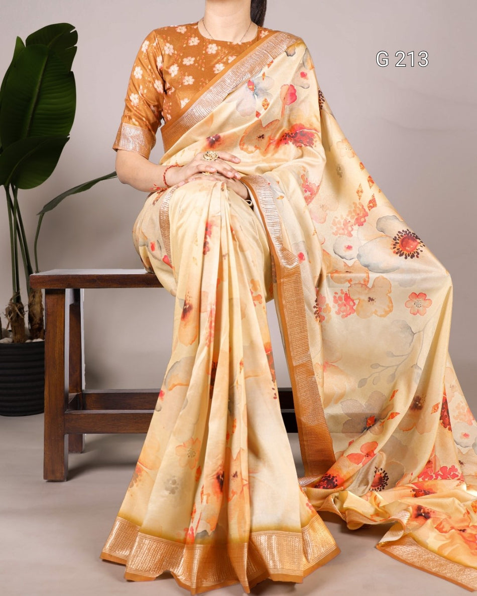 Woman wearing a floral saree with a neutral background