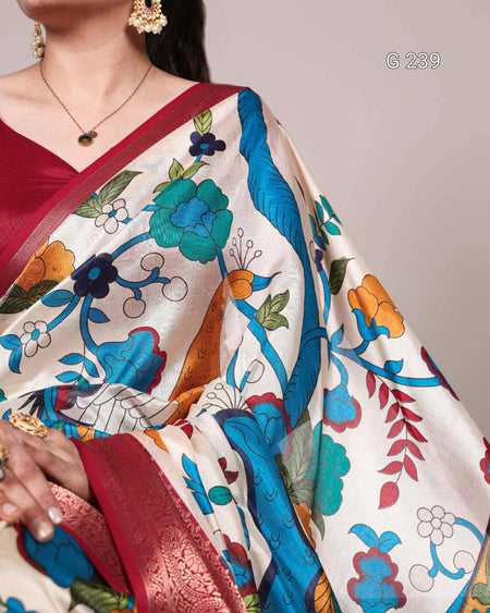 Woman wearing a colorful floral saree with a plain background